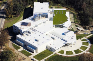 aerial photograph of a building with a white or "cool" roof